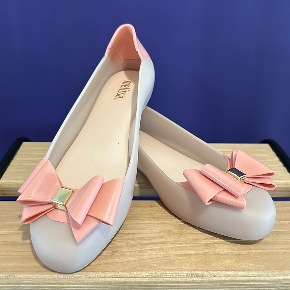 Melissa Bow Jelly pink and gold ballerina flats in Women’s US 7